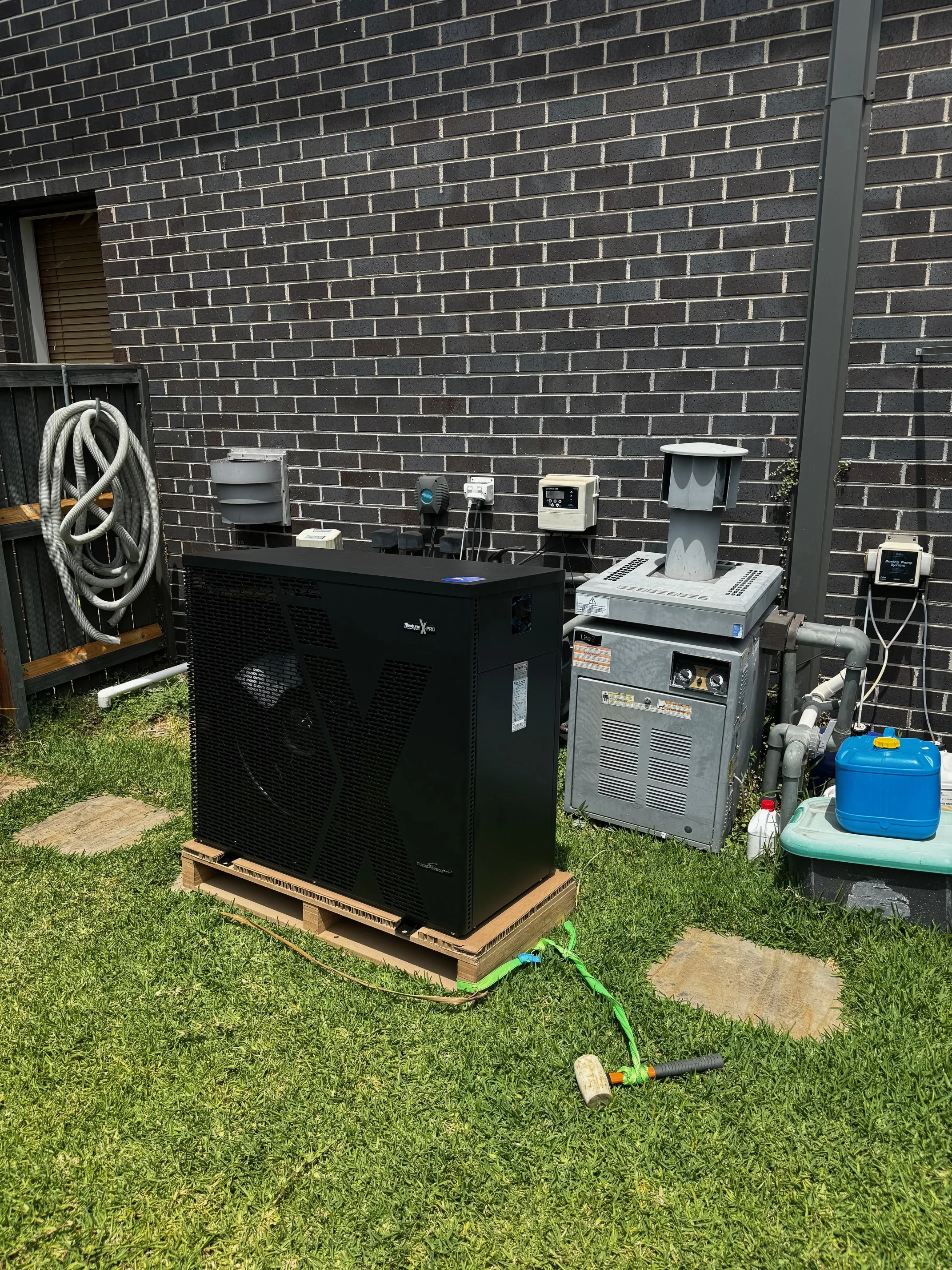 Pool heat pump and equipment enclosure