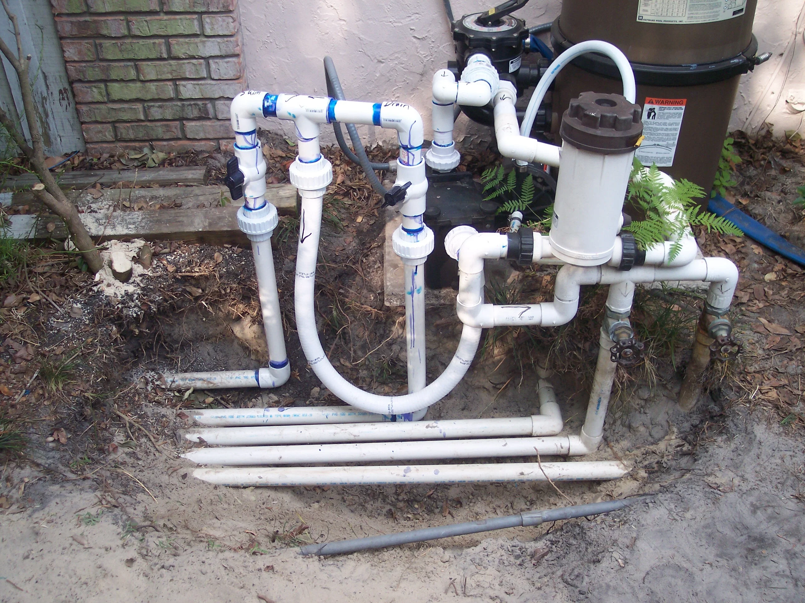 Existing multi-valve pool equipment pad